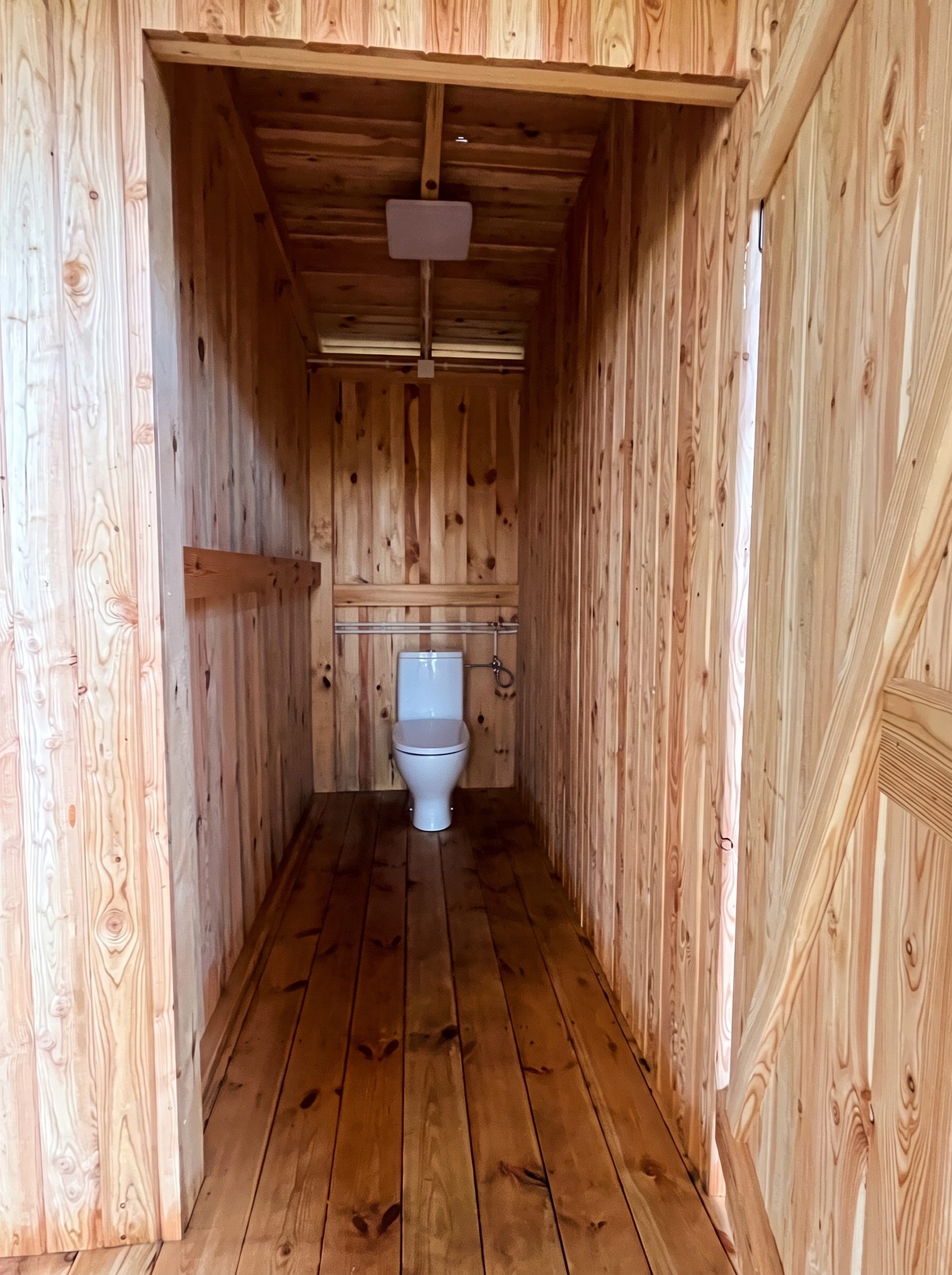 Wooden toilet cabin interior